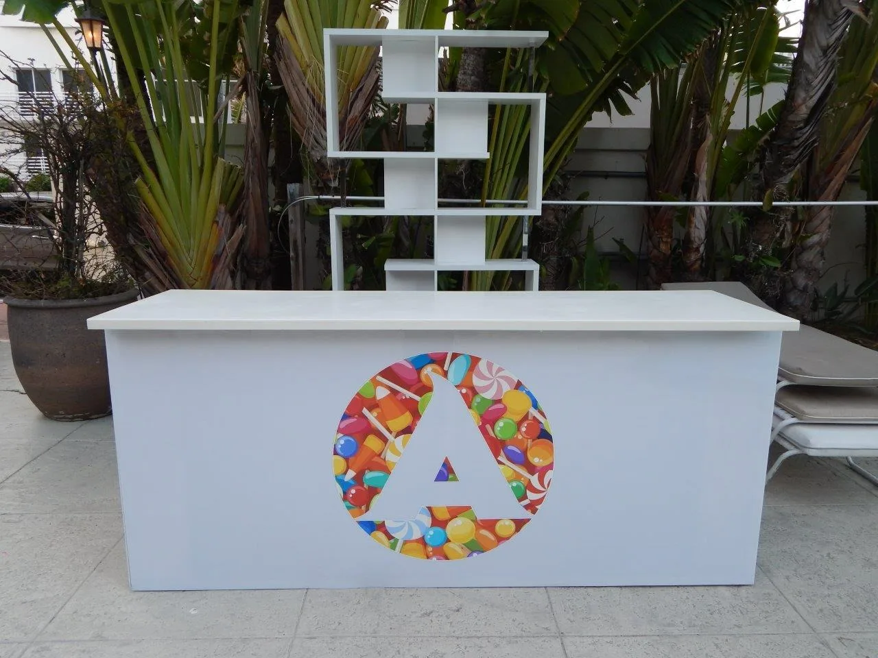 Designer Acrylic Bar 15_ Double Designer Acrylic Bar Black Top - Full Logo Wrap w_ White Wave Back Bar Wall in Pompano Beach, Florida